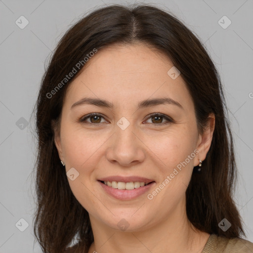 Joyful white young-adult female with long  brown hair and brown eyes