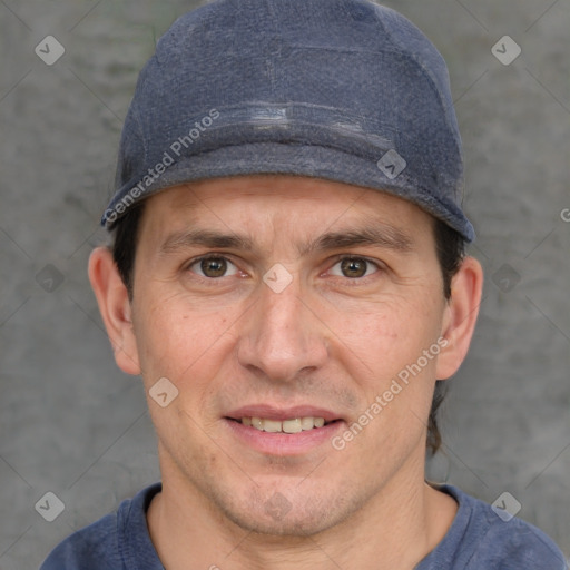 Joyful white adult male with short  brown hair and brown eyes