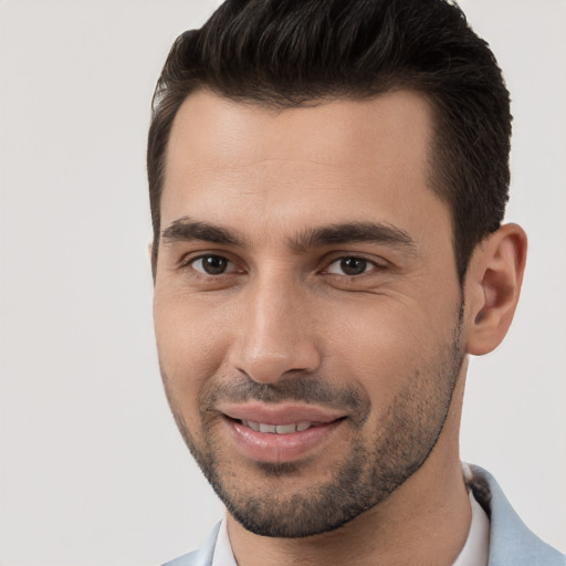 Joyful white young-adult male with short  brown hair and brown eyes