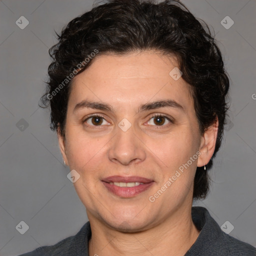 Joyful white adult female with short  brown hair and brown eyes