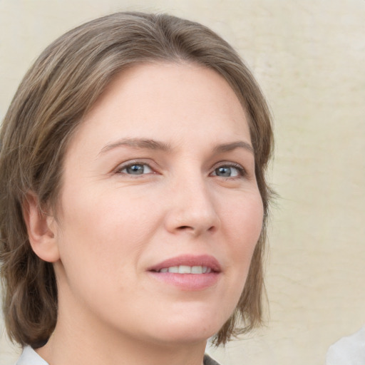 Neutral white young-adult female with medium  brown hair and grey eyes