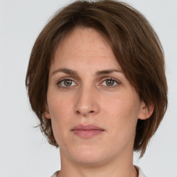 Neutral white young-adult female with short  brown hair and brown eyes