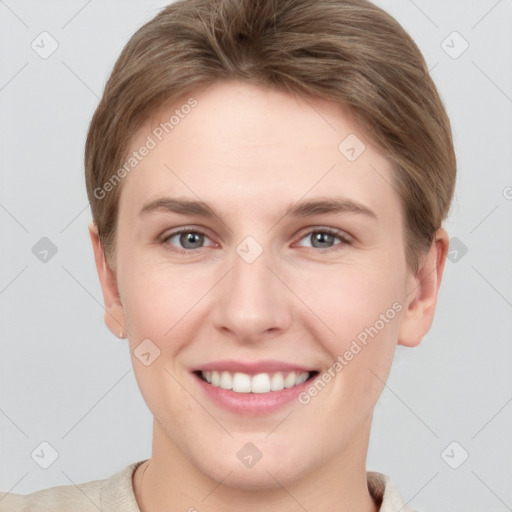 Joyful white young-adult female with short  brown hair and grey eyes