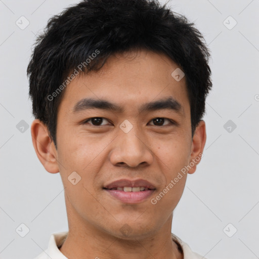 Joyful asian young-adult male with short  brown hair and brown eyes