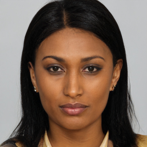 Neutral latino young-adult female with long  black hair and brown eyes