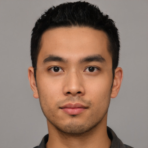 Neutral asian young-adult male with short  black hair and brown eyes