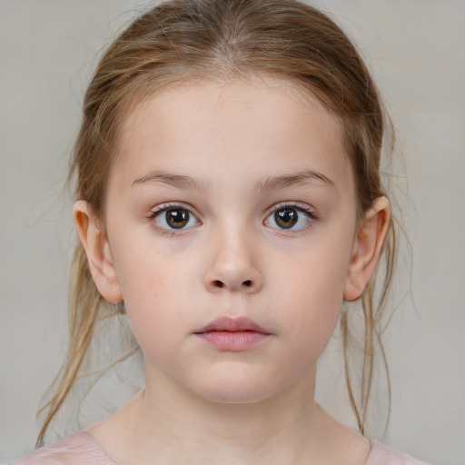 Neutral white child female with medium  brown hair and brown eyes