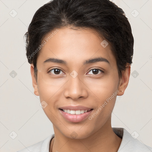 Joyful latino young-adult female with short  brown hair and brown eyes