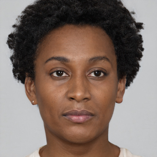 Neutral black young-adult female with short  brown hair and brown eyes