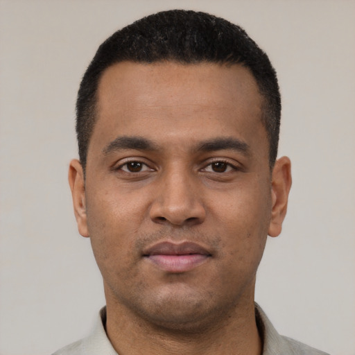 Neutral latino young-adult male with short  black hair and brown eyes