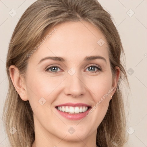 Joyful white young-adult female with long  brown hair and grey eyes