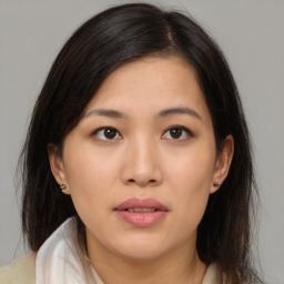 Neutral asian young-adult female with medium  brown hair and brown eyes