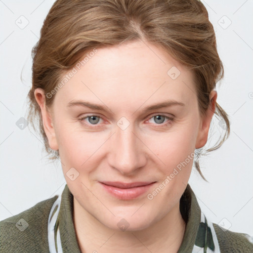 Joyful white young-adult female with medium  brown hair and blue eyes