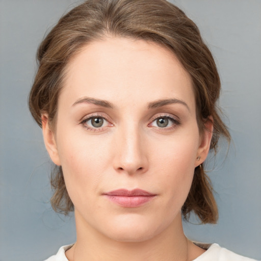 Neutral white young-adult female with medium  brown hair and grey eyes