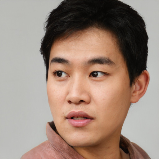 Neutral asian young-adult male with short  black hair and brown eyes