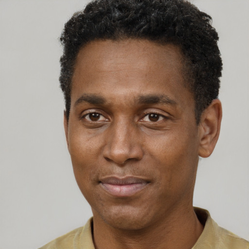 Neutral black young-adult male with short  brown hair and brown eyes