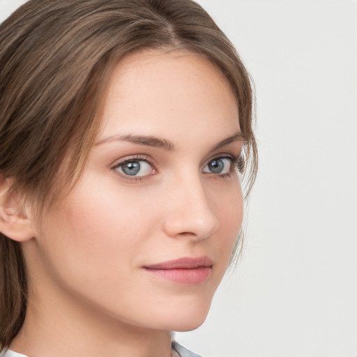 Neutral white young-adult female with medium  brown hair and grey eyes