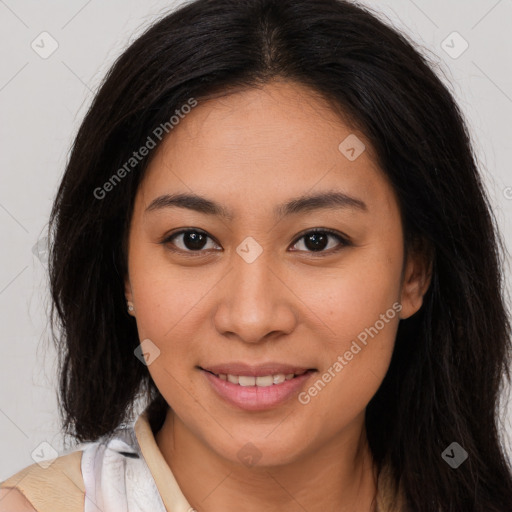 Joyful latino young-adult female with long  brown hair and brown eyes