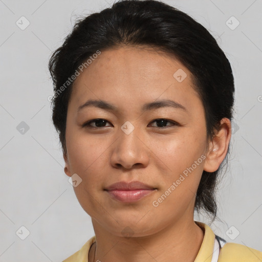 Joyful asian young-adult female with short  brown hair and brown eyes