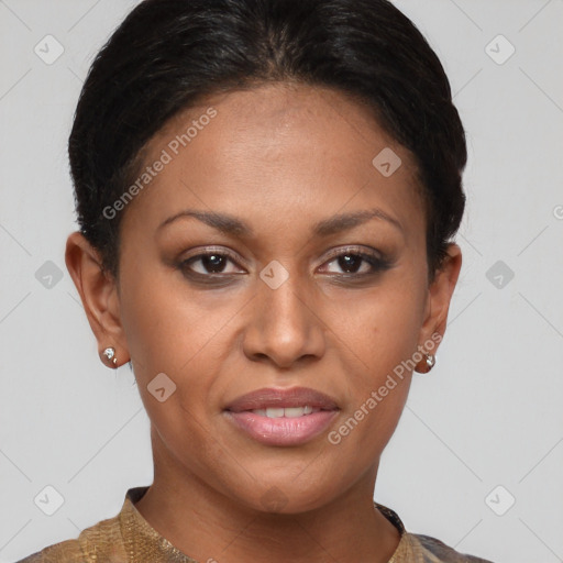 Joyful black young-adult female with short  brown hair and brown eyes