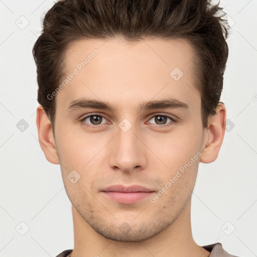 Neutral white young-adult male with short  brown hair and brown eyes