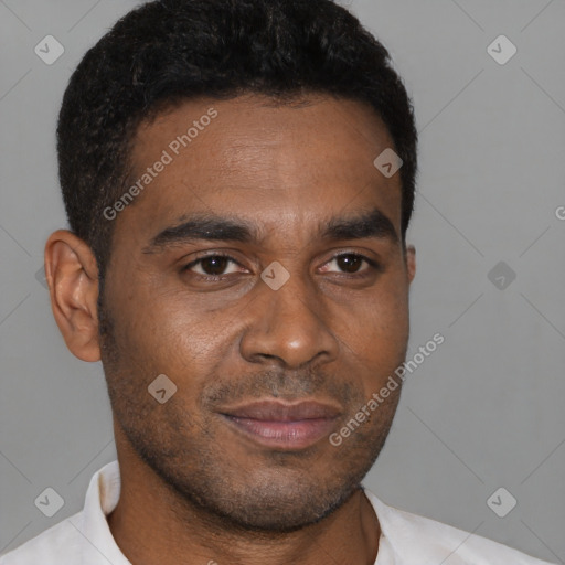 Joyful latino young-adult male with short  brown hair and brown eyes