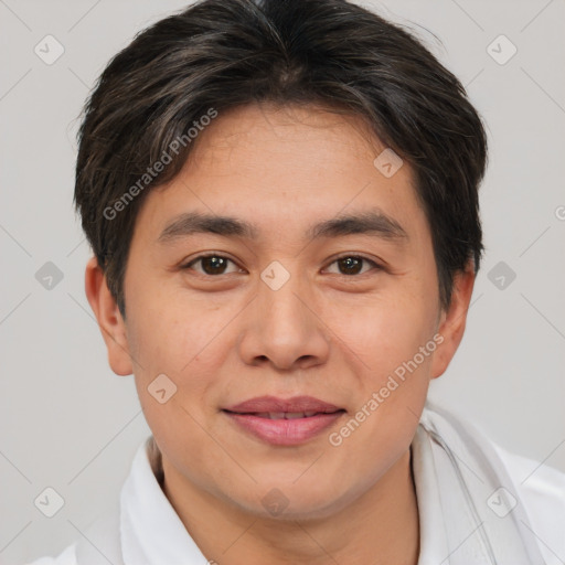 Joyful asian young-adult male with short  brown hair and brown eyes