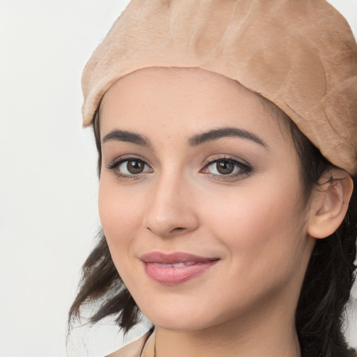 Joyful white young-adult female with medium  black hair and brown eyes