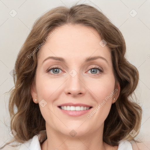 Joyful white young-adult female with medium  brown hair and green eyes