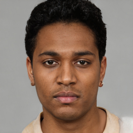 Neutral black young-adult male with short  black hair and brown eyes
