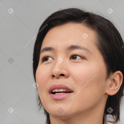 Joyful white young-adult female with medium  brown hair and brown eyes