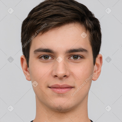 Joyful white young-adult male with short  brown hair and brown eyes