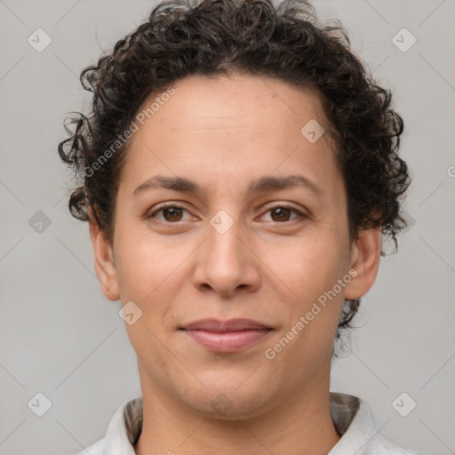 Joyful white adult female with short  brown hair and brown eyes