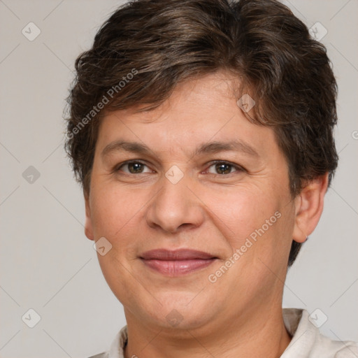 Joyful white adult female with short  brown hair and brown eyes