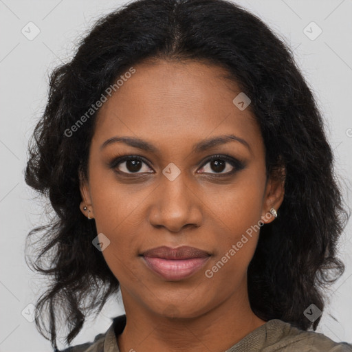 Joyful black young-adult female with long  brown hair and brown eyes