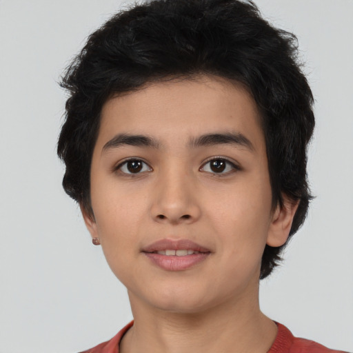 Joyful latino young-adult female with short  black hair and brown eyes