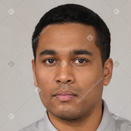 Neutral latino young-adult male with short  black hair and brown eyes