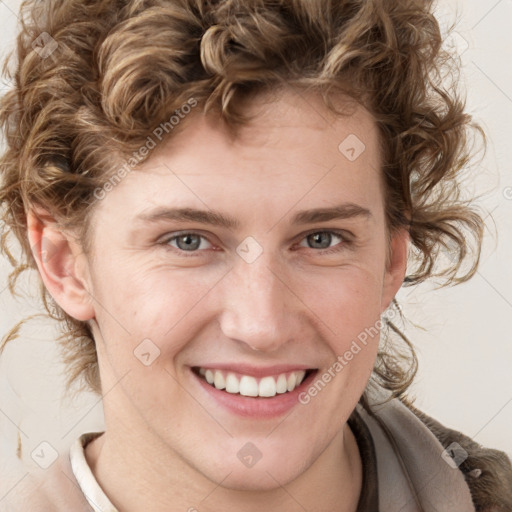 Joyful white young-adult female with medium  brown hair and blue eyes