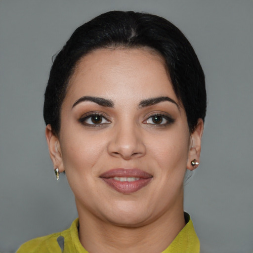 Joyful asian young-adult female with short  black hair and brown eyes