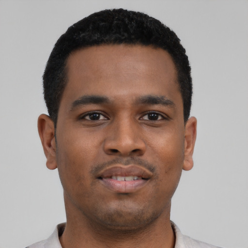 Neutral black young-adult male with short  black hair and brown eyes