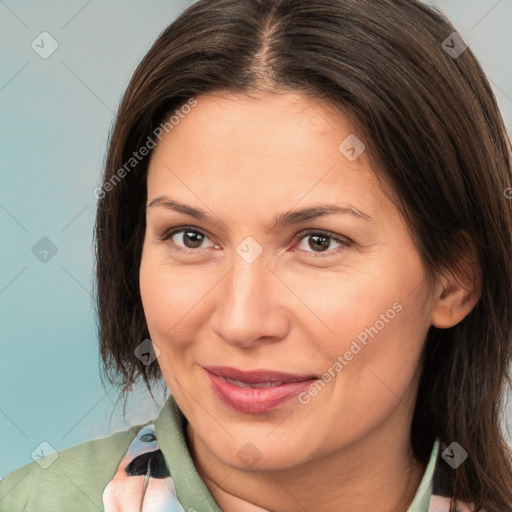 Joyful white adult female with medium  brown hair and brown eyes