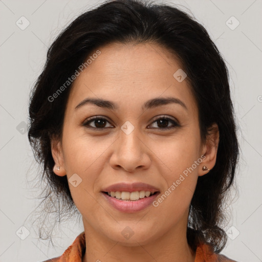 Joyful latino young-adult female with medium  brown hair and brown eyes