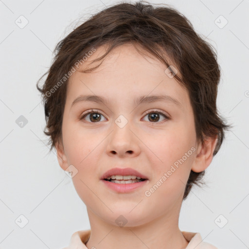 Joyful white child female with short  brown hair and brown eyes