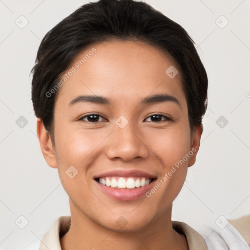 Joyful latino young-adult female with short  brown hair and brown eyes