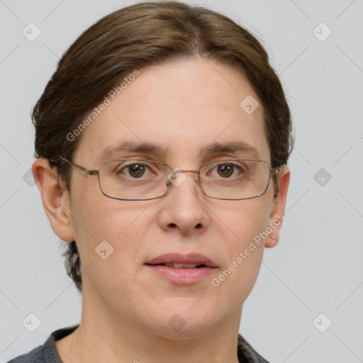 Joyful white adult female with short  brown hair and grey eyes