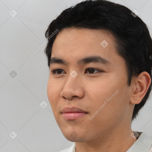 Neutral asian young-adult male with short  black hair and brown eyes