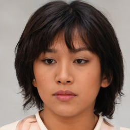 Neutral asian young-adult female with medium  brown hair and brown eyes