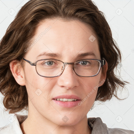 Joyful white young-adult female with medium  brown hair and blue eyes