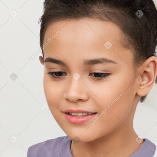 Joyful white child female with short  brown hair and brown eyes