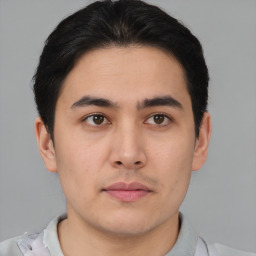 Neutral asian young-adult male with short  brown hair and brown eyes